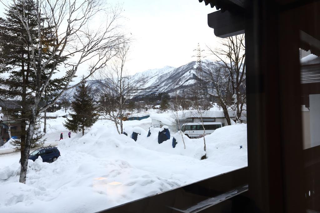 Snowlines Lodge Хакуба-Мура Номер фото