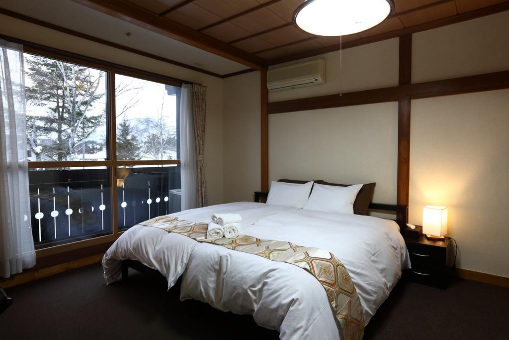 Snowlines Lodge Хакуба-Мура Номер фото